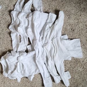 Lot of white baby clothes